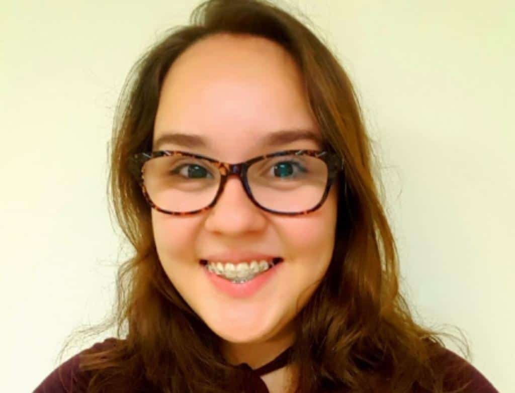 A headshot of Jasmin Preciado, smiling