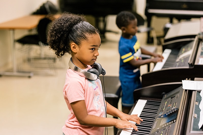 Young students in piano class