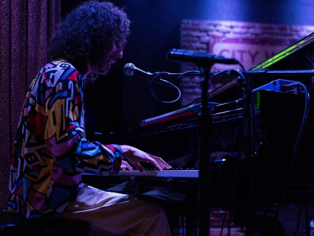 Julian Pujols Quall playing piano