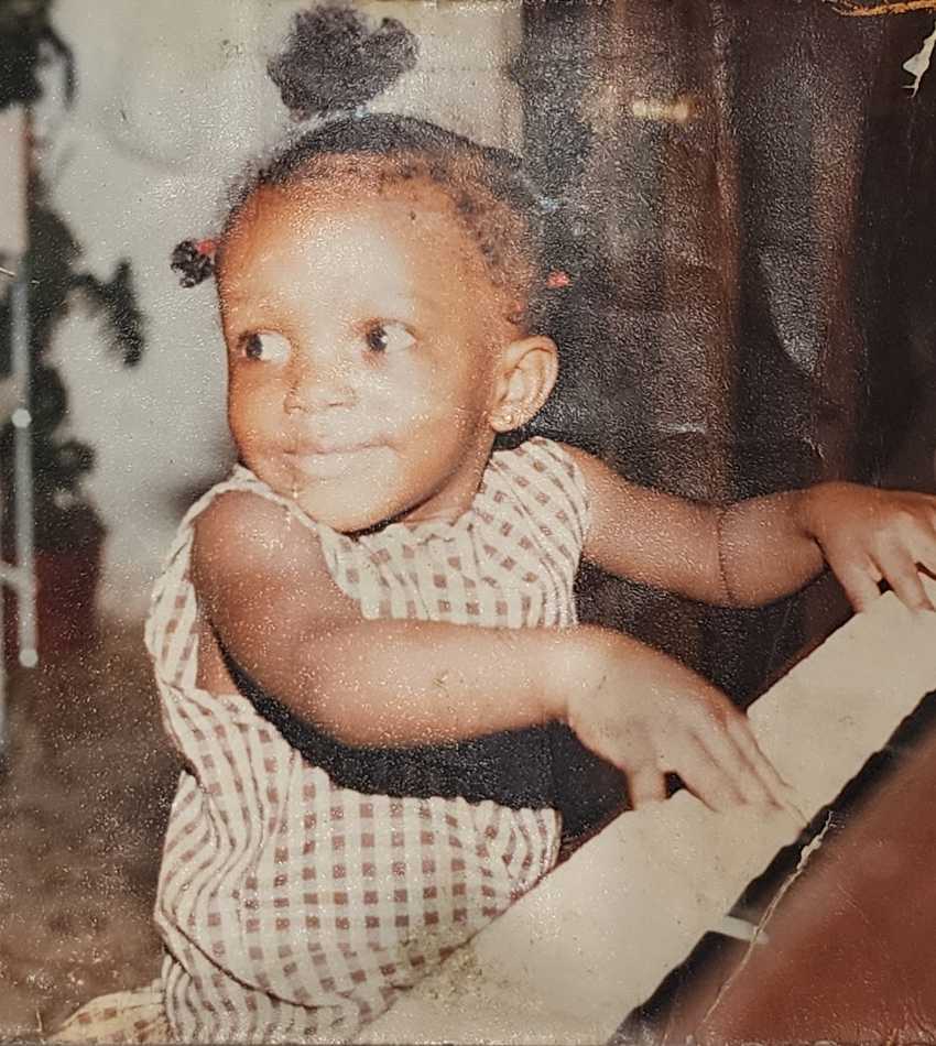 A toddler playing piano.
